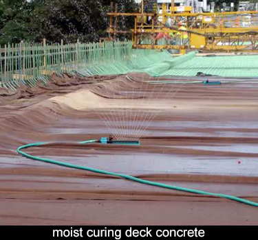 14 days of continuous wet curing of deck concrete